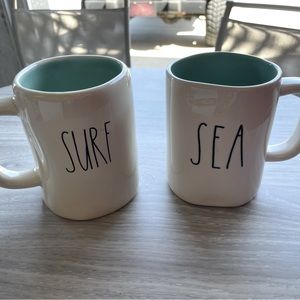 Rae Dunn mugs Sea on one and Surf/Sand on the other